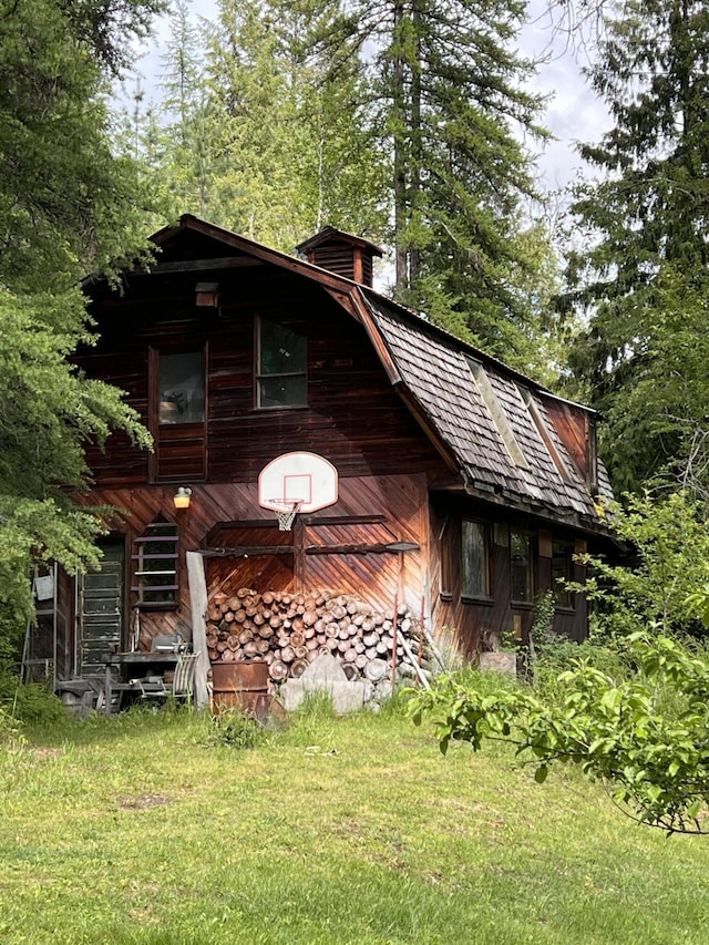 3901 Cedar Creek Rd, Colville, WA 99114 - view of home's exterior with a chimney