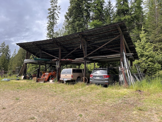 3901 Cedar Creek Rd, Colville, WA 99114 - view of vehicle parking with a carport