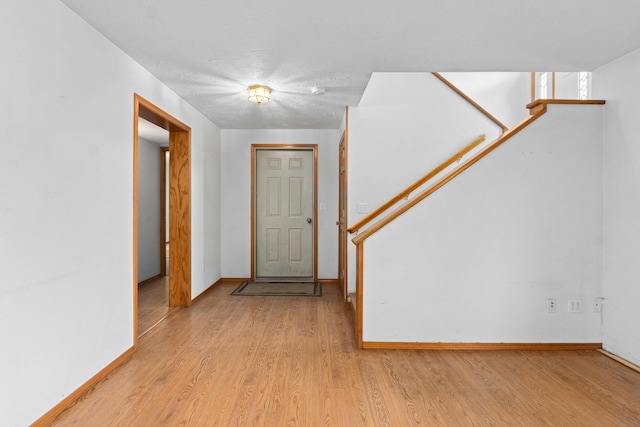2829 Cottonwood Creek Rd, Chewelah, WA 99109 - foyer featuring light wood-type flooring and baseboards