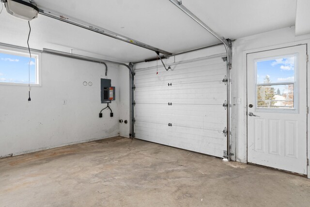 2829 Cottonwood Creek Rd, Chewelah, WA 99109 - garage with a garage door opener and electric panel