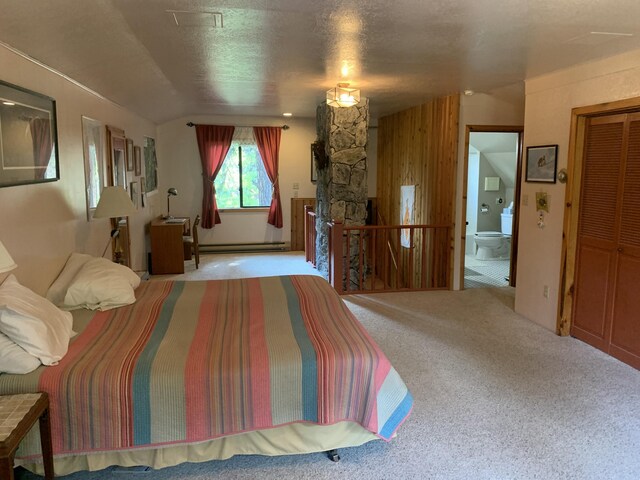 59 Bisbee Creek Ln, Kettle Falls, WA 99141 - carpeted bedroom featuring baseboard heating and ensuite bathroom