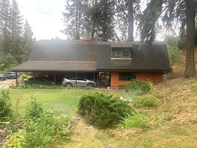 59 Bisbee Creek Ln, Kettle Falls, WA 99141 - view of front of house with a chimney