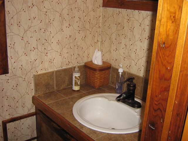 59 Bisbee Creek Ln, Kettle Falls, WA 99141 - bathroom featuring wallpapered walls and vanity