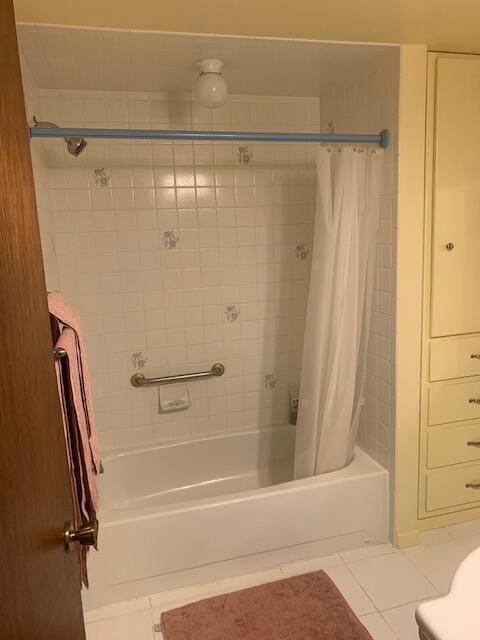 59 Bisbee Creek Ln, Kettle Falls, WA 99141 - bathroom with shower / bathtub combination with curtain and tile patterned flooring