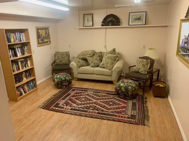 59 Bisbee Creek Ln, Kettle Falls, WA 99141 - living room with wood finished floors and built in features