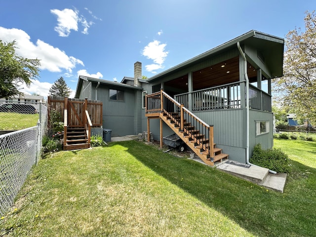 824 S Chester St, Colville, WA 99114 - rear view of property featuring stairs, a deck, and a chimney