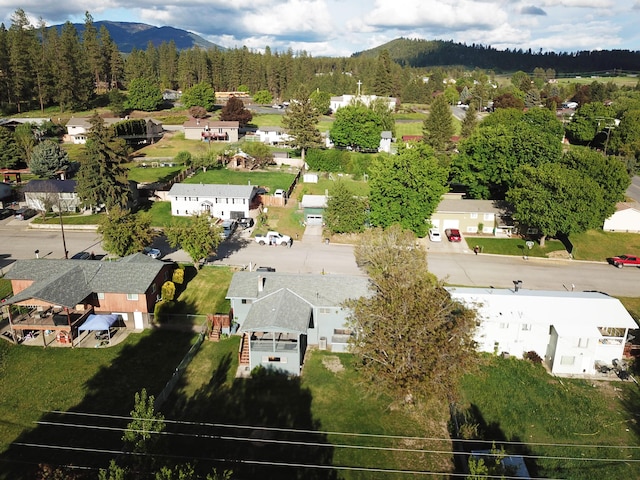 824 S Chester St, Colville, WA 99114 - aerial perspective of suburban area with a mountainous background and a forest