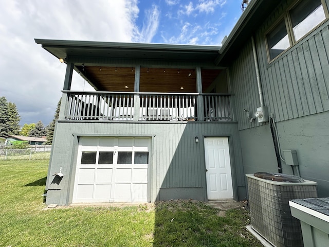824 S Chester St, Colville, WA 99114 - rear view of property with central AC unit, a balcony, and a yard