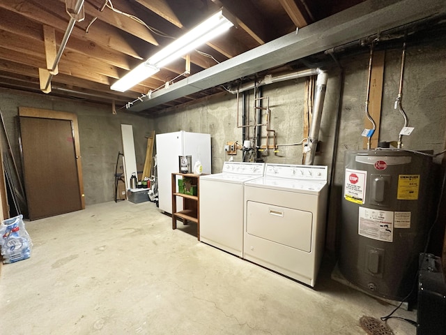 824 S Chester St, Colville, WA 99114 - unfinished below grade area featuring electric water heater, white fridge with ice dispenser, and washing machine and dryer