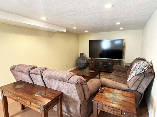 824 S Chester St, Colville, WA 99114 - living room featuring recessed lighting, baseboards, and a textured ceiling