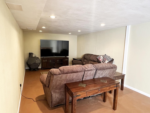 824 S Chester St, Colville, WA 99114 - living room featuring recessed lighting, baseboards, and a textured ceiling