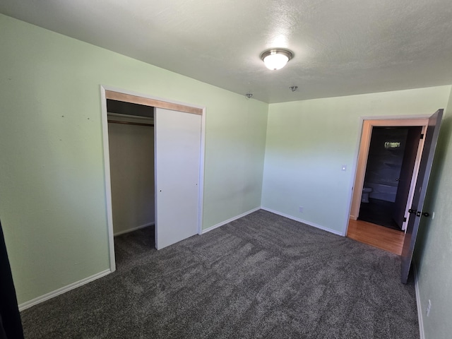 641 S Alder St, Colville, WA 99114 - unfurnished bedroom featuring carpet floors, baseboards, and a closet