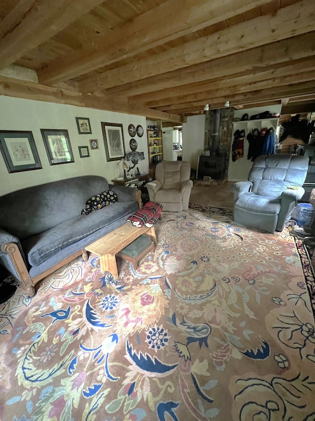 unfurnished living room featuring beamed ceiling and wood ceiling