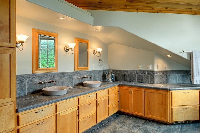 bathroom featuring recessed lighting, tile patterned floors, and a sink
