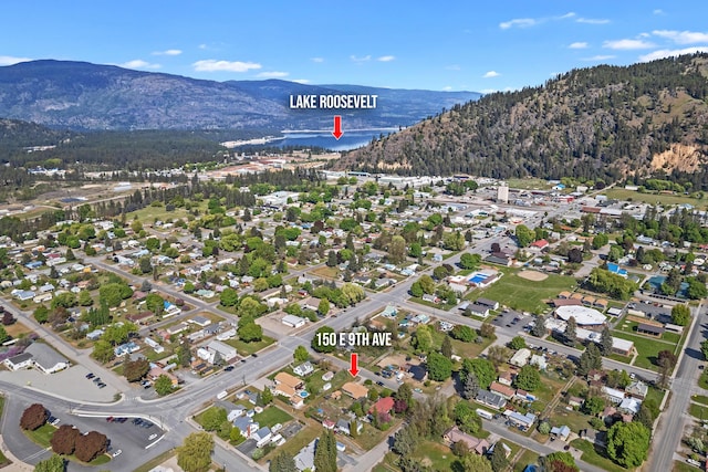 aerial view of property's location featuring mountains