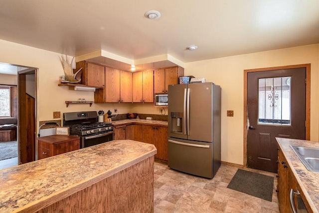 kitchen featuring sink and appliances with stainless steel finishes