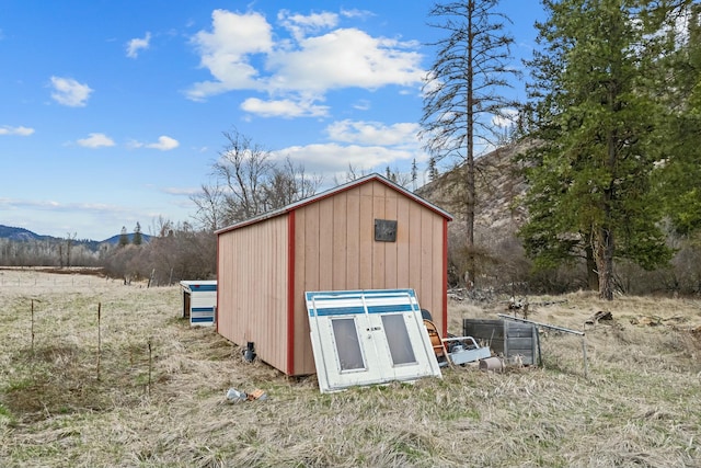 3032 Wrights Valley Rd, Chewelah, WA 99109 - view of shed with a mountain view and fence