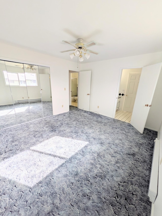 1262 E Elep Ave, Colville, WA 99114 - unfurnished bedroom featuring a baseboard heating unit, carpet, a closet, and ceiling fan
