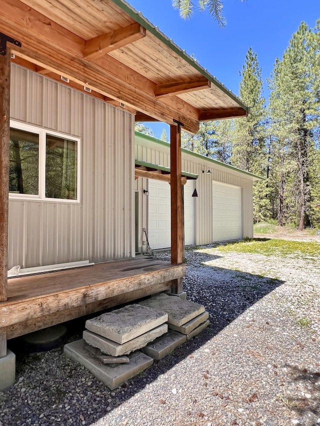 exterior space with an outdoor structure and a garage