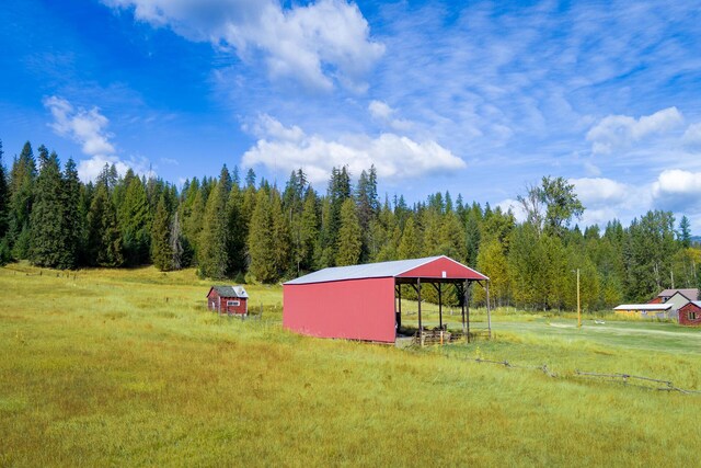 1873 Greenhouse Rd, Ione, WA 99139 - view of yard featuring an outbuilding and a rural view