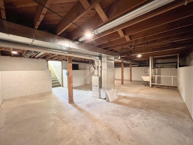 basement featuring heating unit