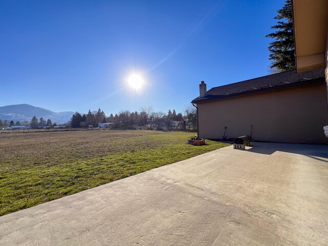 view of patio featuring a mountain view