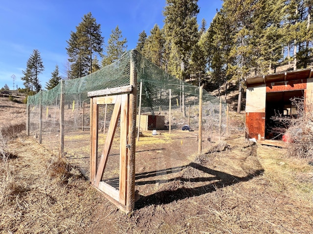 view of play area featuring an outbuilding