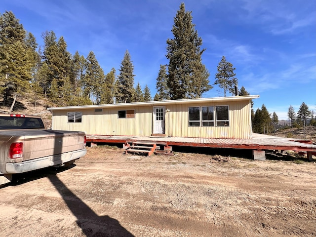 manufactured / mobile home featuring a wooden deck