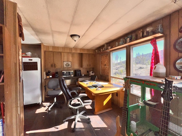 office area with wooden walls