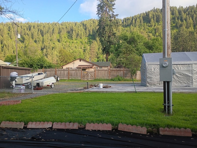 1208 Overlook Blvd, Marcus, WA 99151 - view of yard with a wooded view