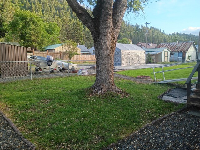 1208 Overlook Blvd, Marcus, WA 99151 - view of yard with a wooded view and a residential view