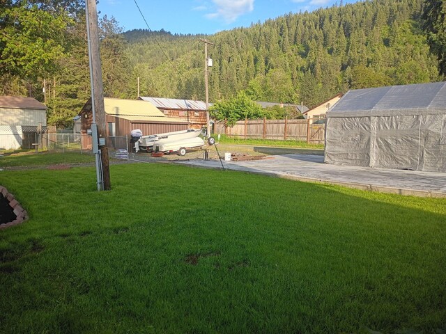 1208 Overlook Blvd, Marcus, WA 99151 - view of yard featuring a view of trees