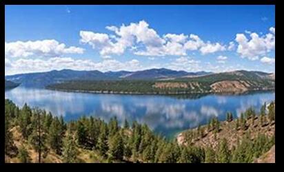 1208 Overlook Blvd, Marcus, WA 99151 - water view with a mountain backdrop and a forest