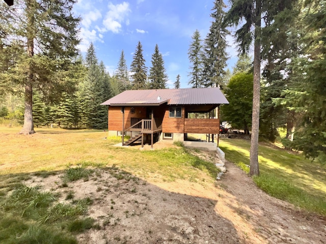 exterior space with a lawn