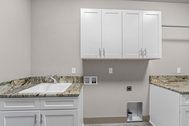 231 Hogans Way, Chewelah, WA 99109 - washroom featuring hookup for an electric dryer, cabinet space, and washer hookup