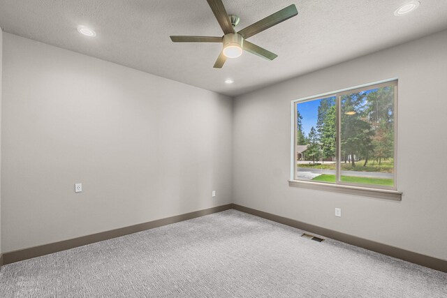 231 Hogans Way, Chewelah, WA 99109 - carpeted empty room featuring ceiling fan, recessed lighting, and a textured ceiling