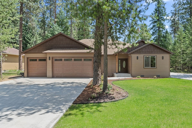 231 Hogans Way, Chewelah, WA 99109 - view of front of home with driveway, an attached garage, a front lawn, and a shingled roof