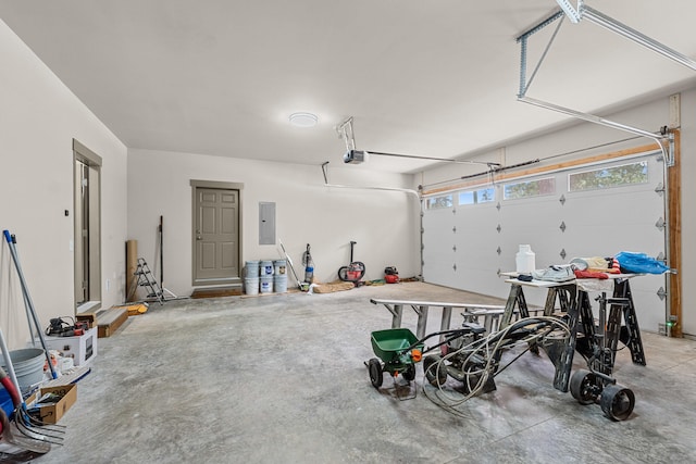 231 Hogans Way, Chewelah, WA 99109 - garage with a garage door opener and electric panel