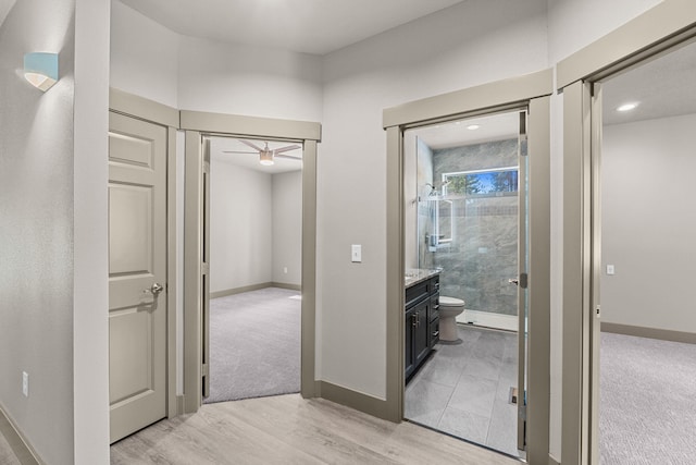 231 Hogans Way, Chewelah, WA 99109 - corridor with light wood-type flooring and light carpet