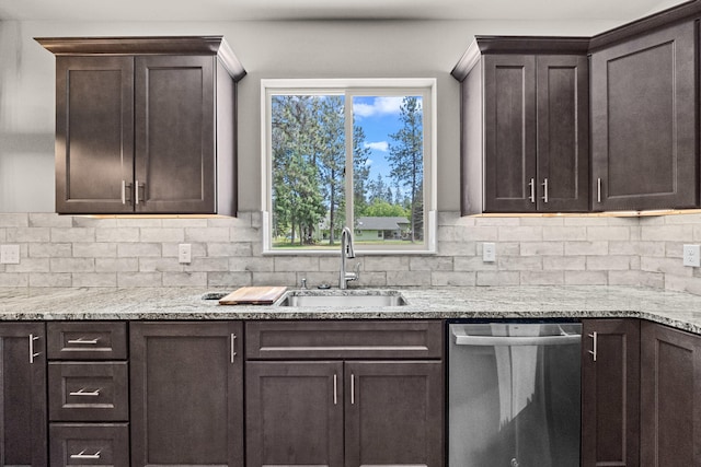 231 Hogans Way, Chewelah, WA 99109 - kitchen featuring dishwasher, dark brown cabinets, backsplash, and light stone counters