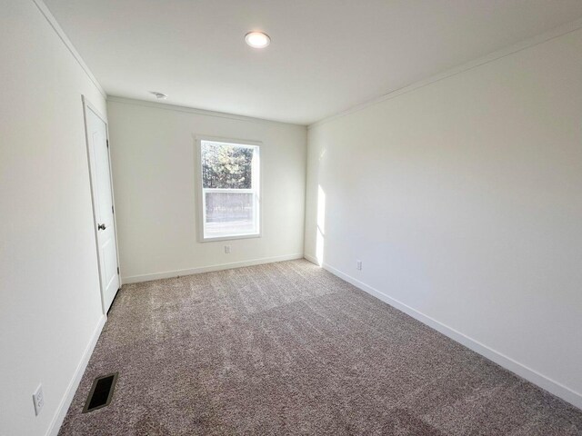 1388 Ponderosa Way, Kettle Falls, WA 99141 - empty room featuring recessed lighting, visible vents, ornamental molding, baseboards, and light colored carpet
