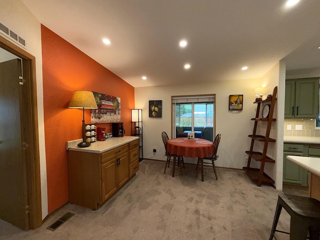 49 Sandpiper Way, Republic, WA 99166 - dining room featuring light carpet, recessed lighting, and vaulted ceiling