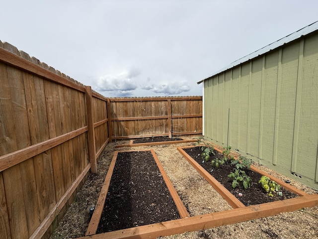 49 Sandpiper Way, Republic, WA 99166 - fenced backyard featuring a garden