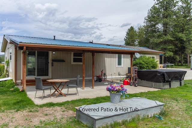 40009 N Sherman Rd, Deer Park, WA 99006 - rear view of property featuring a patio area and metal roof