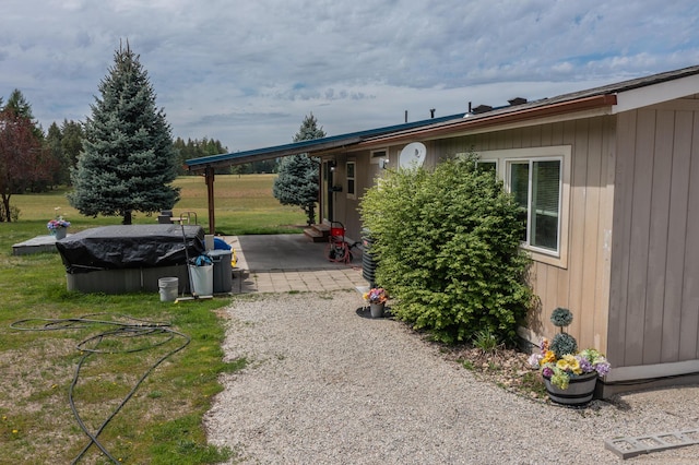 40009 N Sherman Rd, Deer Park, WA 99006 - view of green lawn featuring a patio area