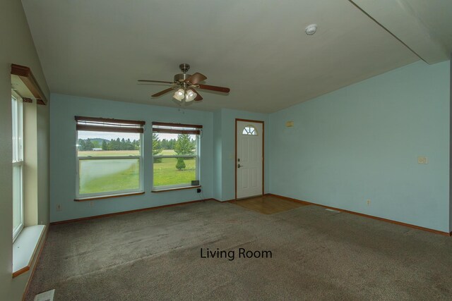 40009 N Sherman Rd, Deer Park, WA 99006 - unfurnished room with carpet floors, ceiling fan, baseboards, and a smoke detector