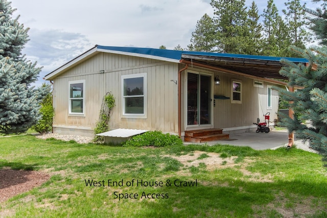 40009 N Sherman Rd, Deer Park, WA 99006 - back of property with a lawn and entry steps