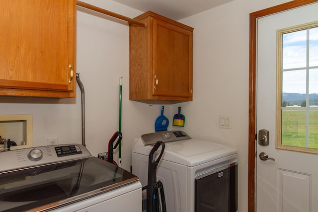 40009 N Sherman Rd, Deer Park, WA 99006 - washroom with washing machine and dryer and cabinet space