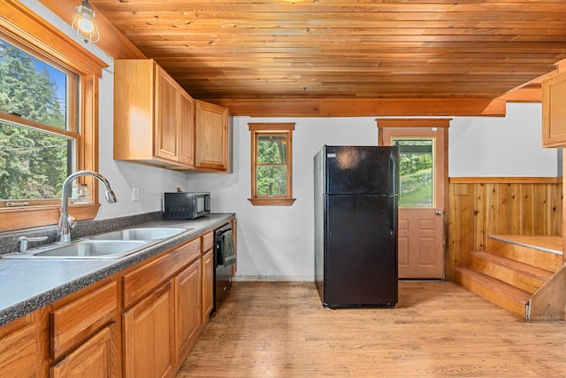 2184 Clugston Onion Creek Rd, Colville, WA 99114 - kitchen with black appliances, wood ceiling, dark countertops, light wood-style floors, and wood walls