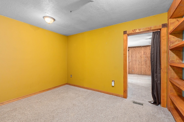 2184 Clugston Onion Creek Rd, Colville, WA 99114 - carpeted spare room featuring a textured ceiling and baseboards